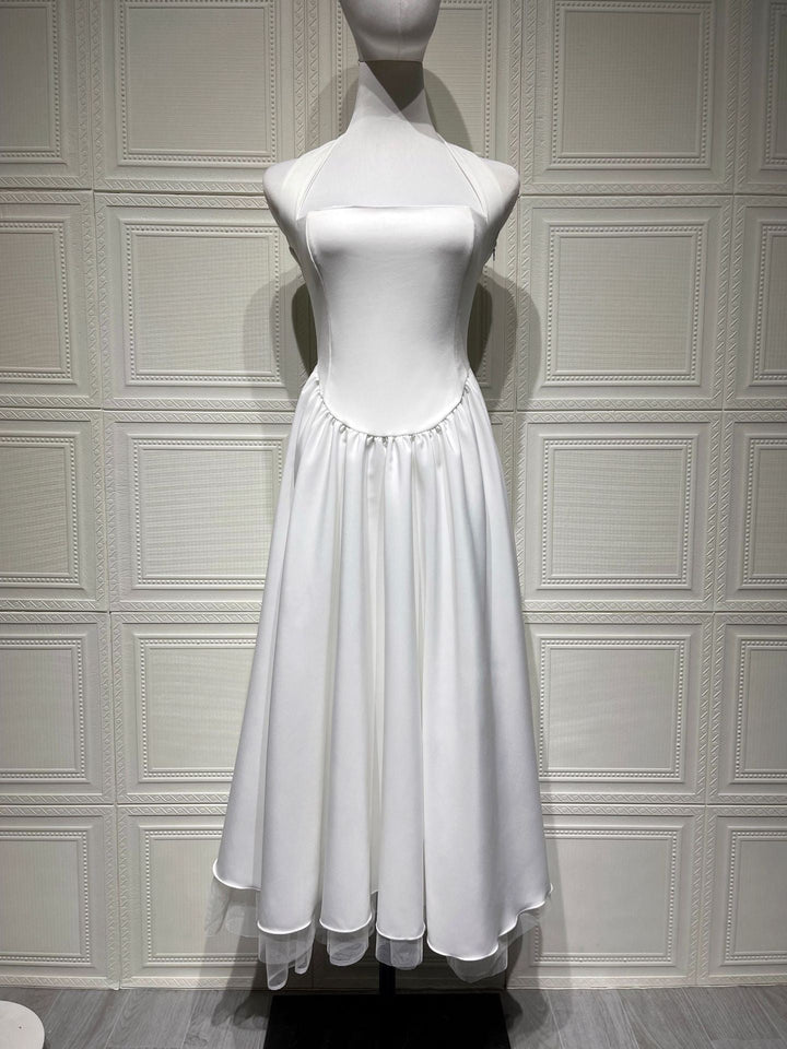 Marlene midi dress with a neck tie, open back, and tulle trim