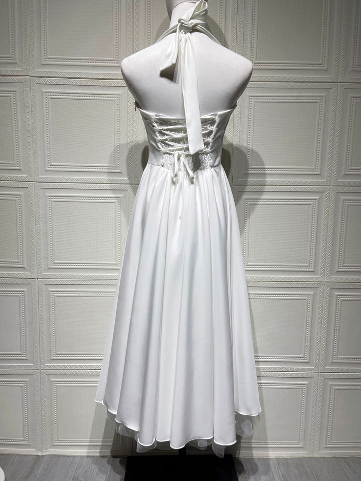 Marlene midi dress with a neck tie, open back, and tulle trim