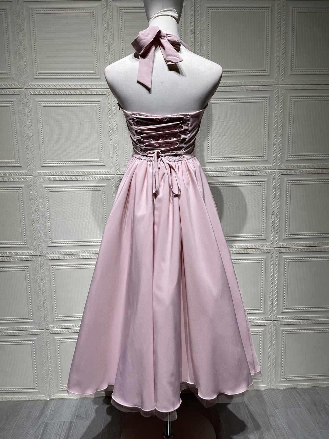 Marlene midi dress with a neck tie, open back, and tulle trim