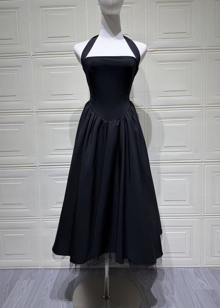 Marlene midi dress with a neck tie, open back, and tulle trim