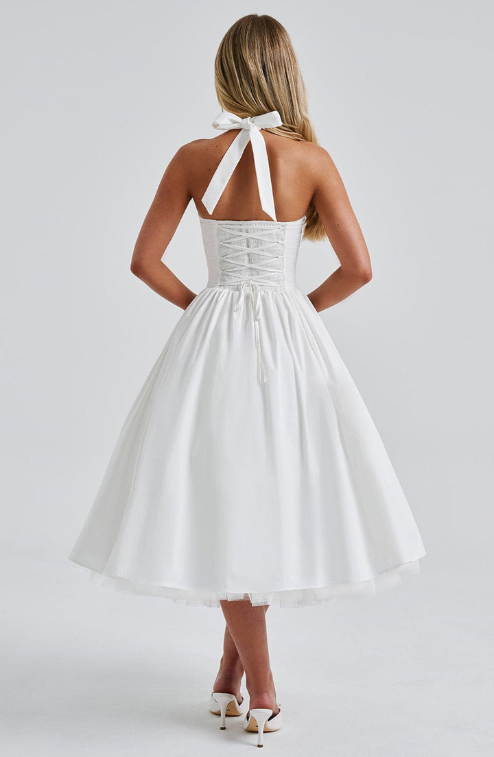 Marlene midi dress with a neck tie, open back, and tulle trim