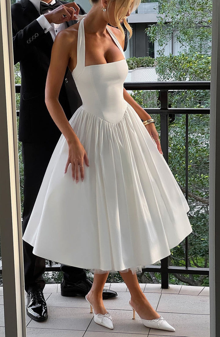 Marlene midi dress with a neck tie, open back, and tulle trim
