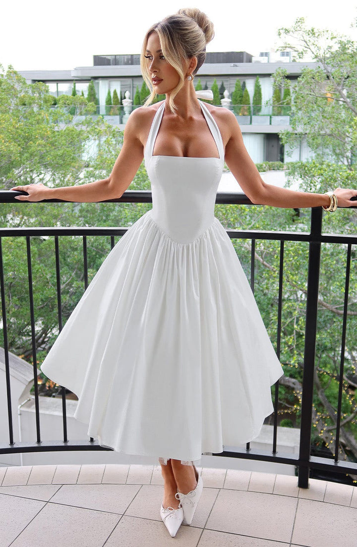 Marlene midi dress with a neck tie, open back, and tulle trim