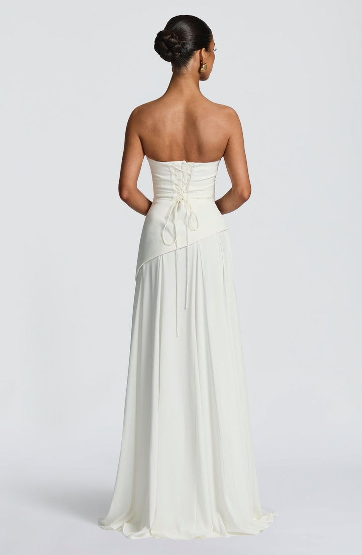 Strapless maxi dress with back ties for a fitted waist, chiffon skirt, and matching scarf