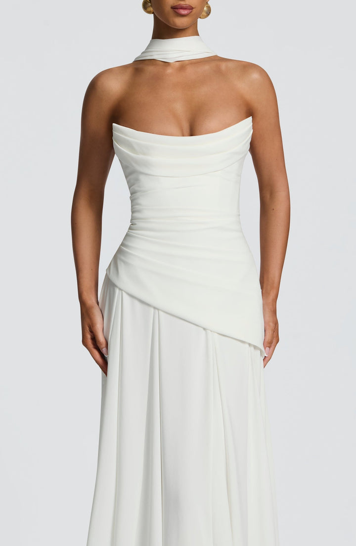 Strapless maxi dress with back ties for a fitted waist, chiffon skirt, and matching scarf