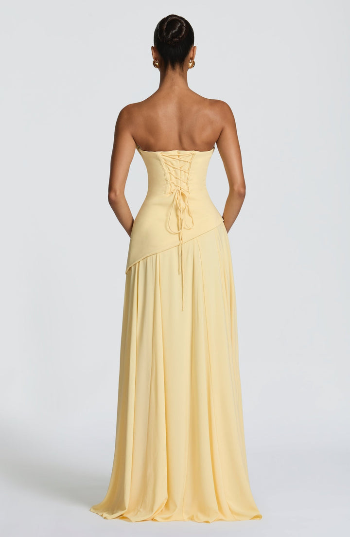 Strapless maxi dress with back ties for a fitted waist, chiffon skirt, and matching scarf