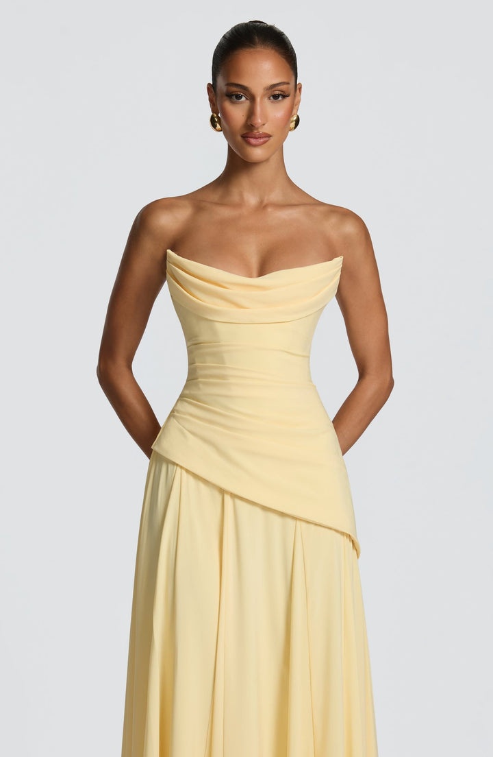 Strapless maxi dress with back ties for a fitted waist, chiffon skirt, and matching scarf