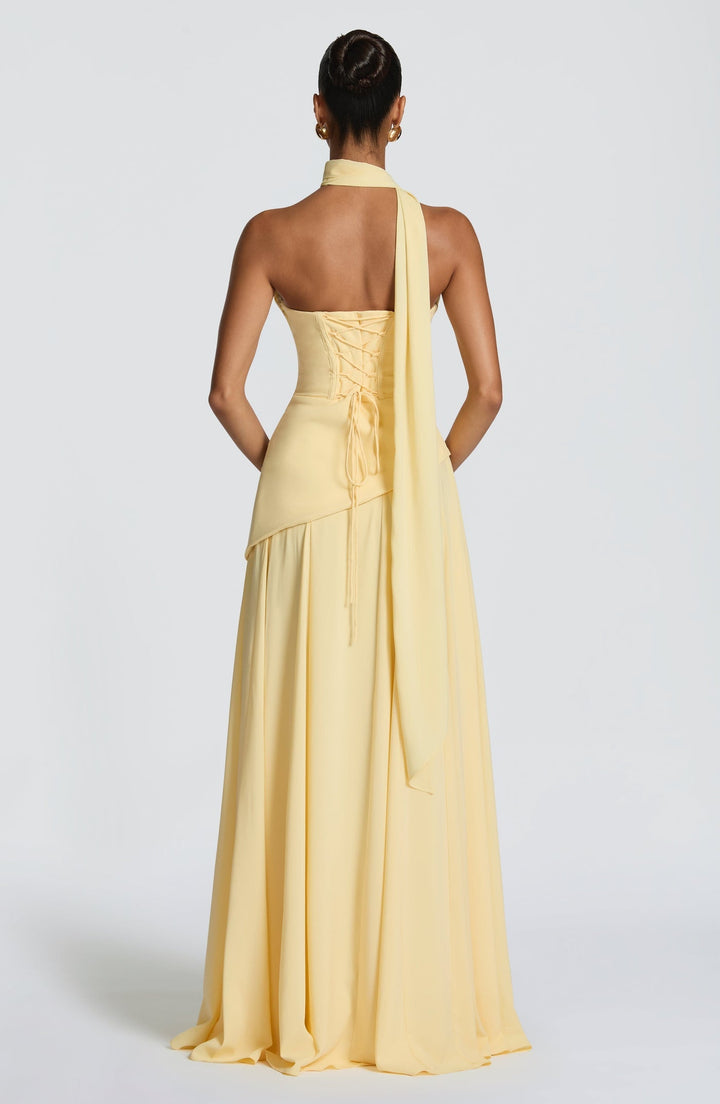 Strapless maxi dress with back ties for a fitted waist, chiffon skirt, and matching scarf