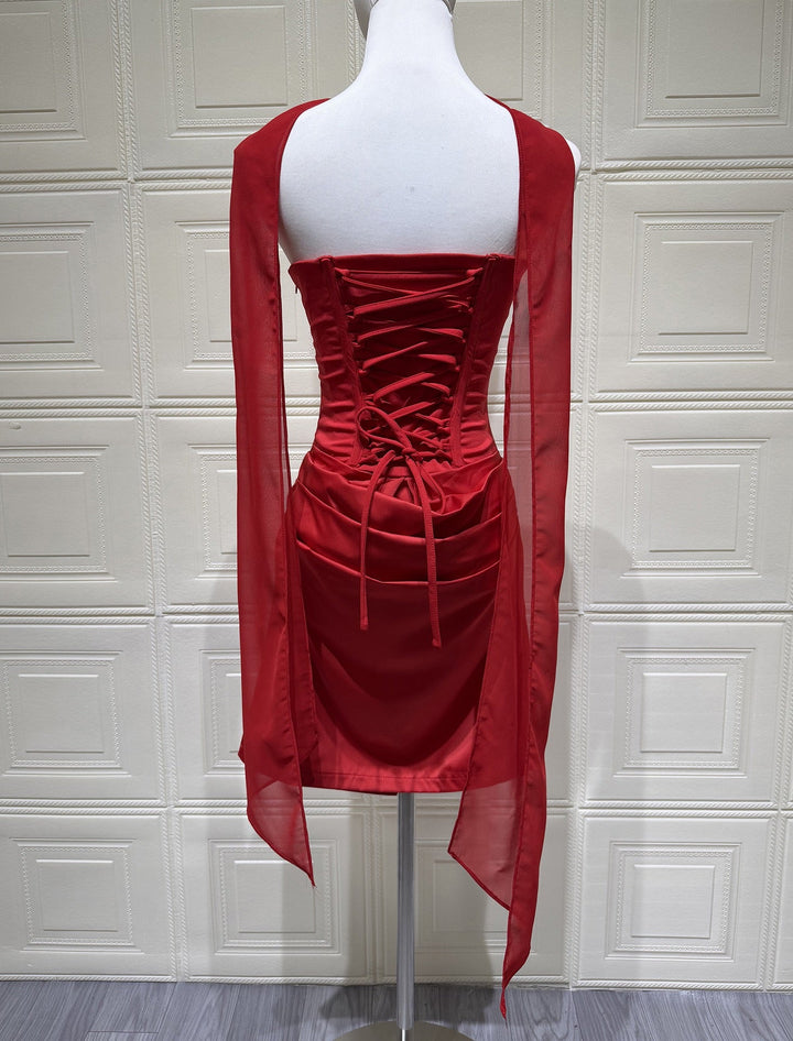 GENNA strapless satin mini dress with pleats, a tie-up corset at the back for a fitted waist, and a scarf detail