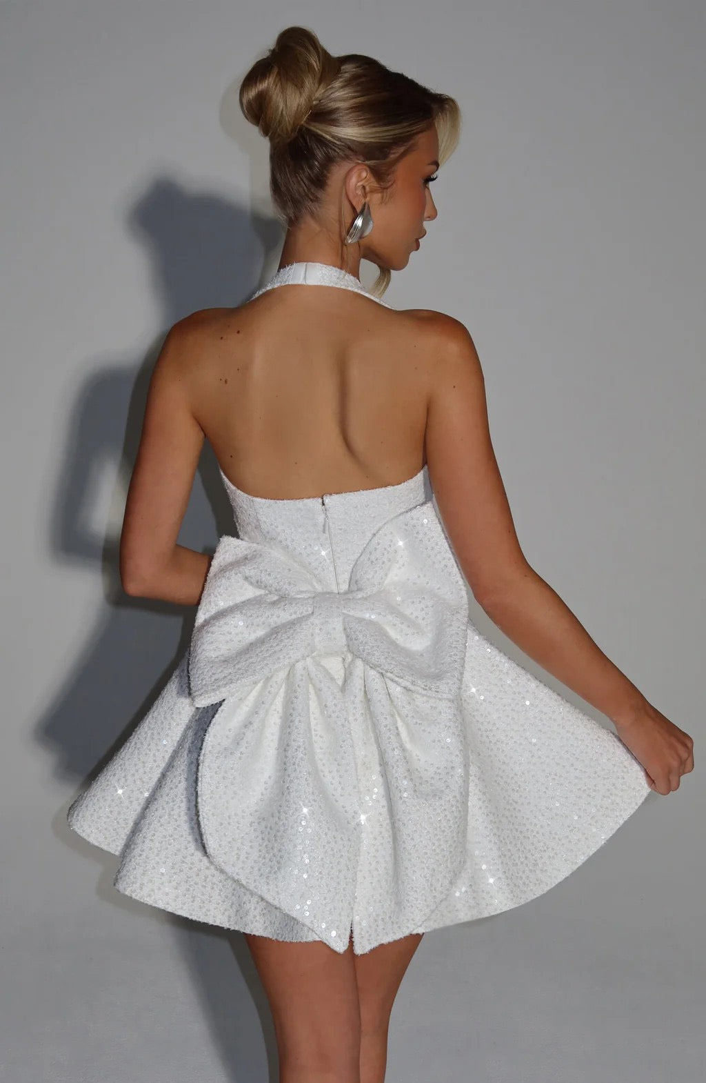 Sequin mini dress with open back and bow tie design - PIA