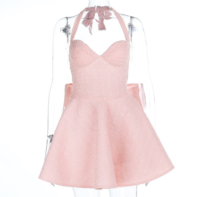 Sequin mini dress with open back and bow tie design - PIA