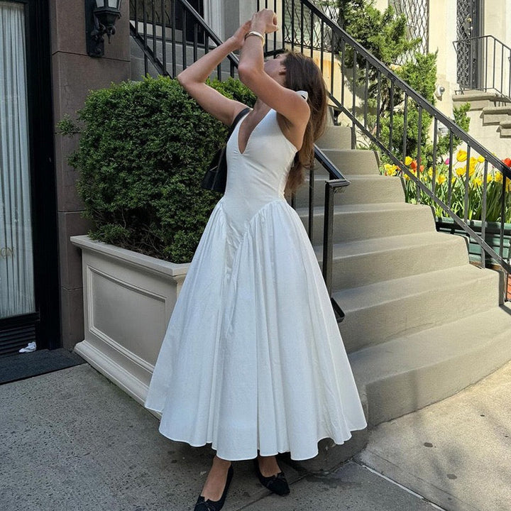 AMALIYA A-line maxi dress with a neck tie and open back
