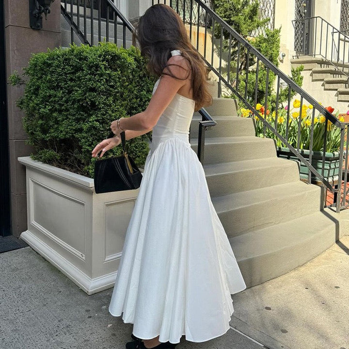 AMALIYA A-line maxi dress with a neck tie and open back