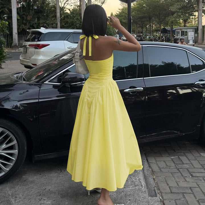 AMALIYA A-line maxi dress with a neck tie and open back