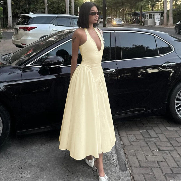 AMALIYA A-line maxi dress with a neck tie and open back