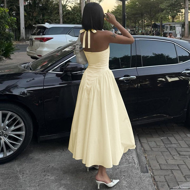 AMALIYA A-line maxi dress with a neck tie and open back