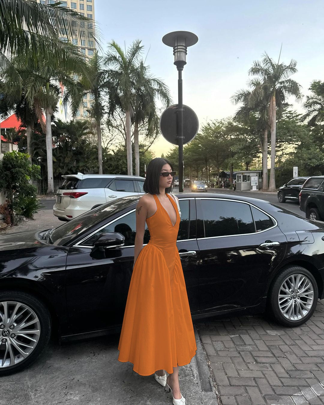 AMALIYA A-line maxi dress with a neck tie and open back