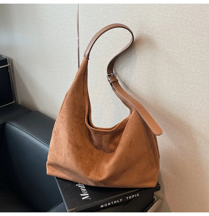 Suede bag with retro design