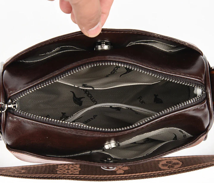 Faux leather bag with strap design