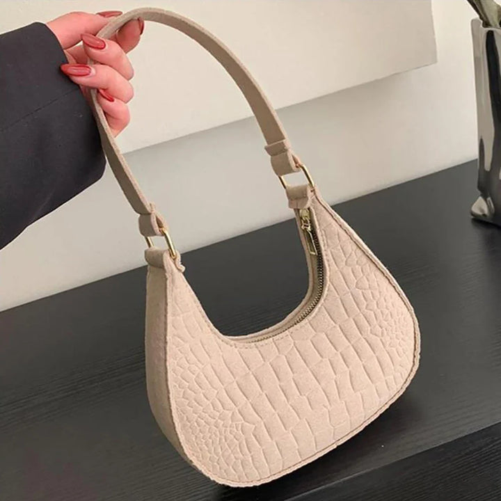 Faux leather bag with rough texture design