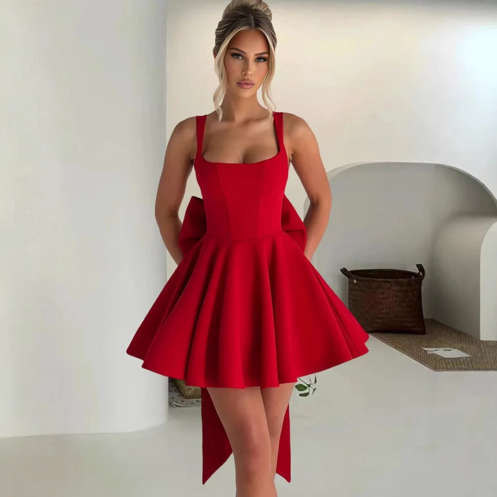 שמלת מיני בגזרת A בעיטור פפיון - אמה