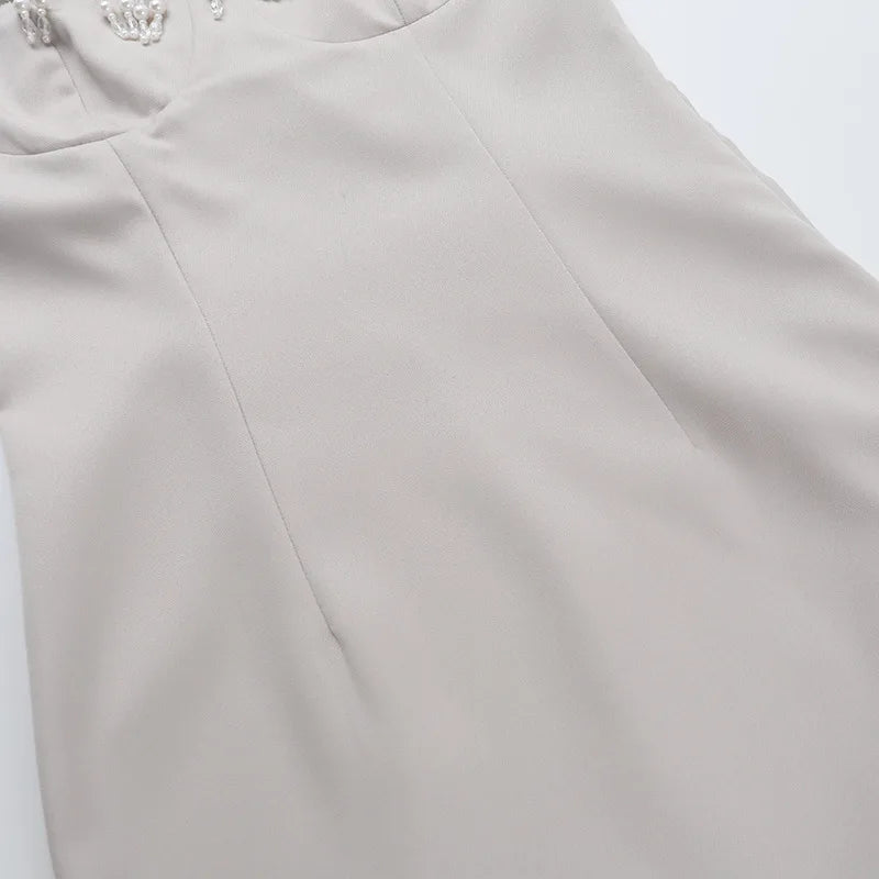 שמלת מידי בד מחטב בעיטור חרוזים בעיצוב שסע - ברברה