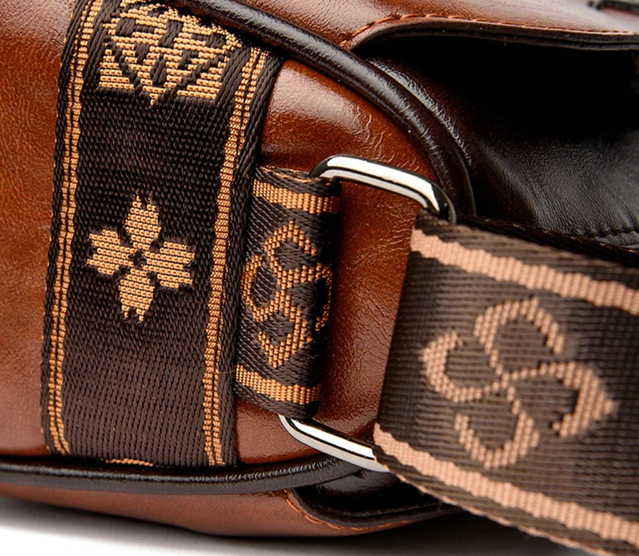 Faux leather bag with strap design