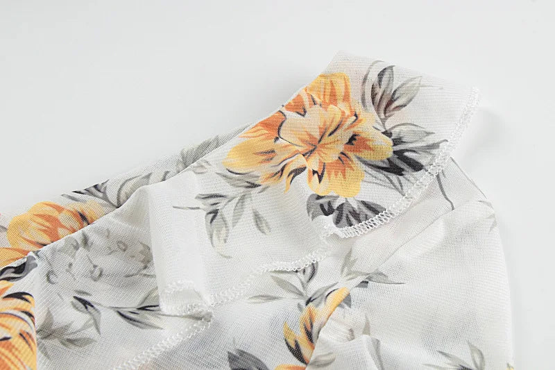 שמלת מיני שיפון פרחונית מלמלה - מרי לין