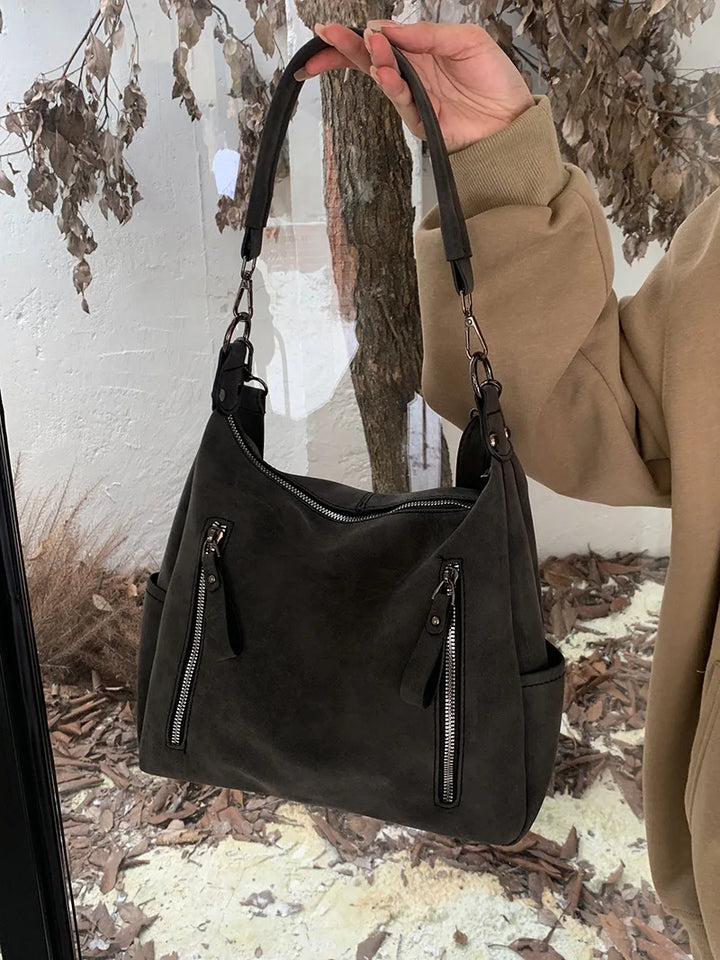 Bag with retro-style faux leather design