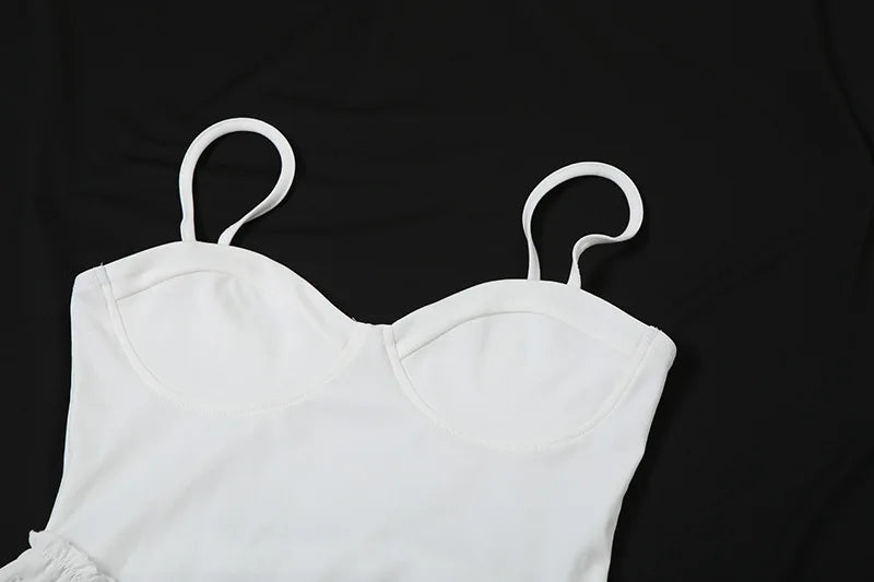 שמלת מיני בגזרת A כתפיות ספגטי בעיטור רקמת עלים ופרחים - שילה