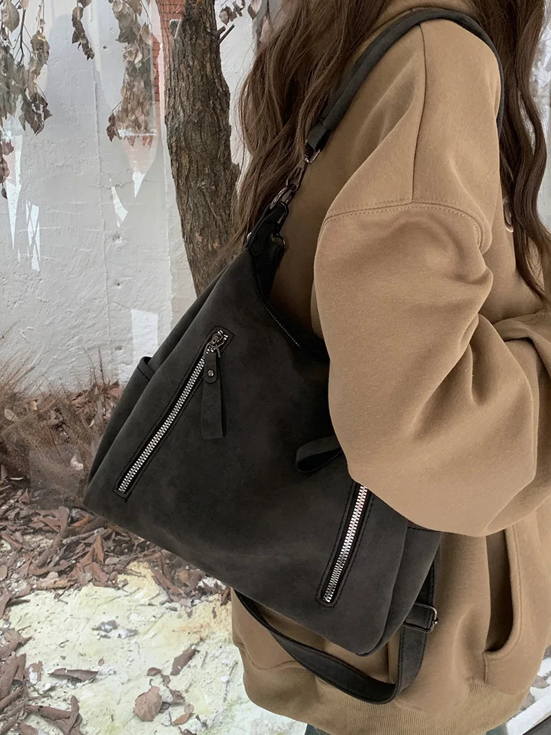Bag with retro-style faux leather design