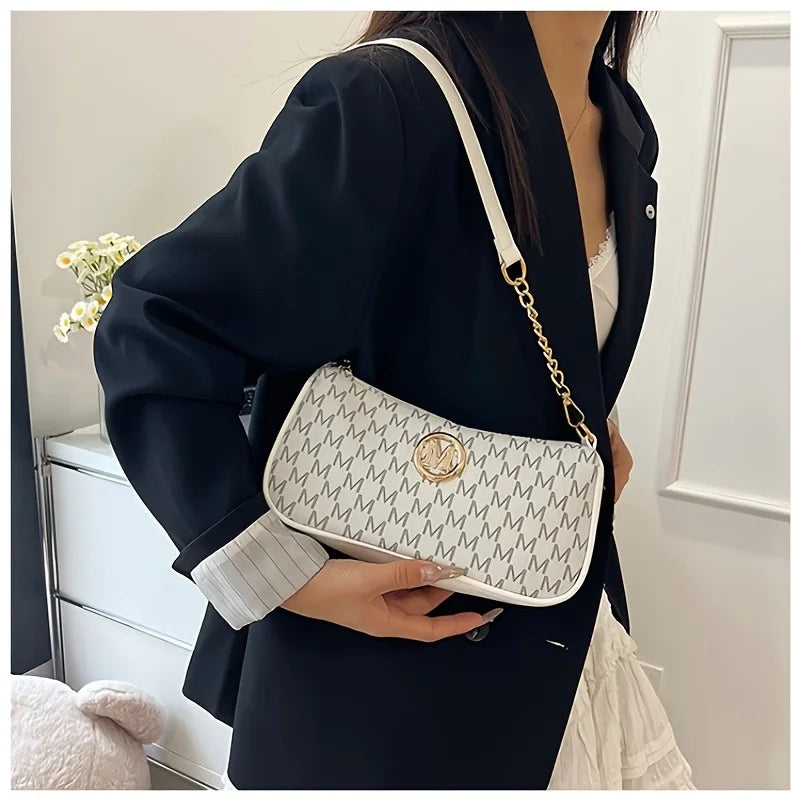 Handbag with M design