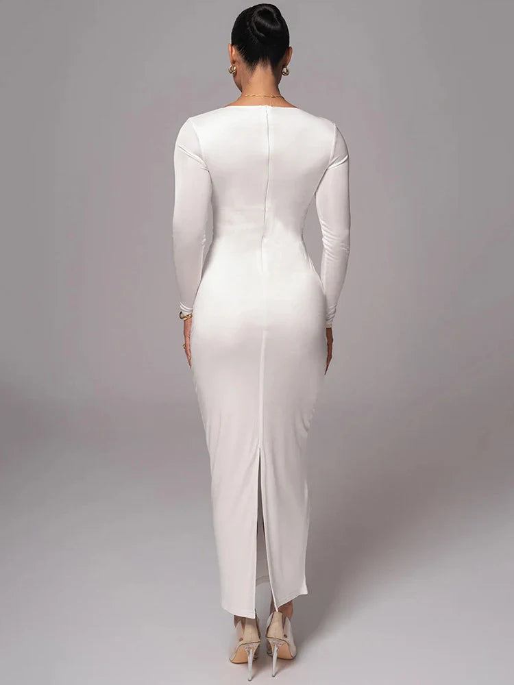 שמלת מקסי צמודה בד מחטב ומחמיא בעיצוב פתחים ואבזמים - לאורין