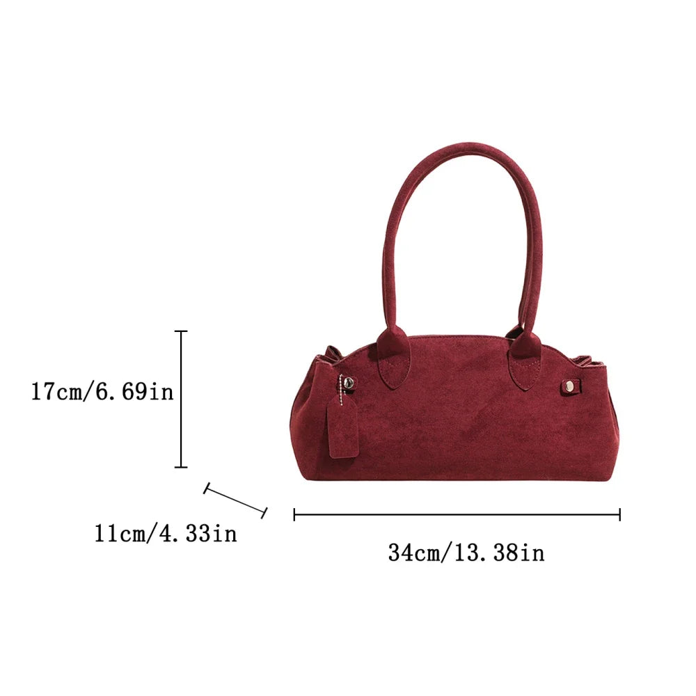 Suede bag with retro design