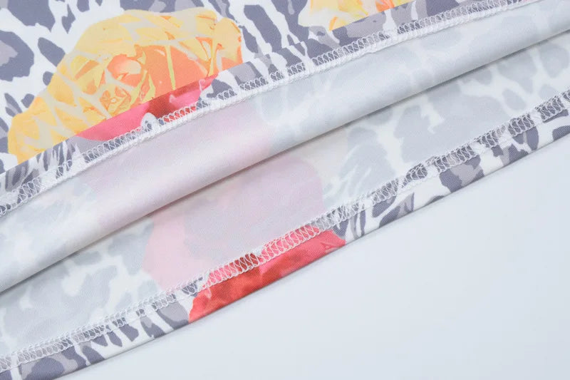 שמלת מקסי הדפס מנומר ופרחים גב פתוח - נוריה