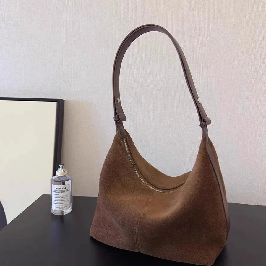 Suede bag with classic design