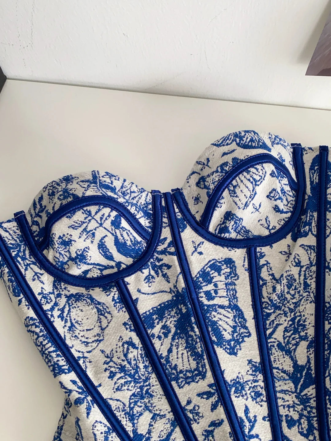 Corset with flower and butterfly design