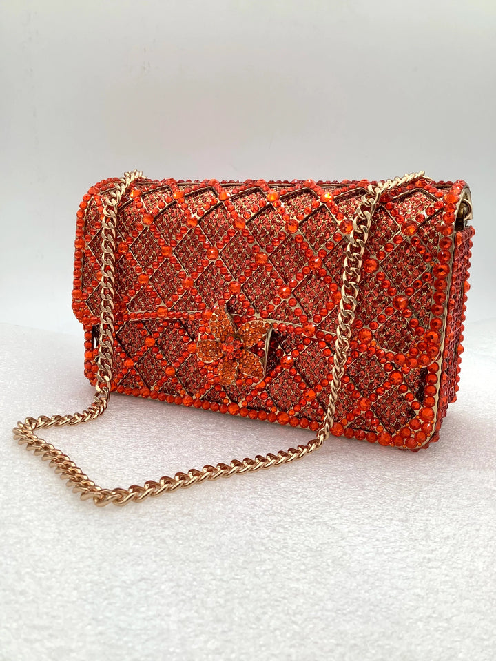Sequin bag with diamond pattern and flower decoration