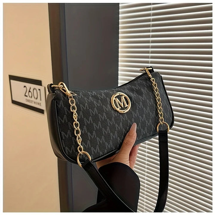 Handbag with M design
