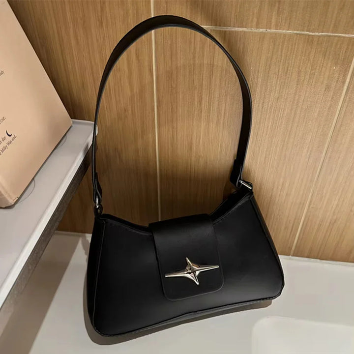 Faux leather bag with buckle design