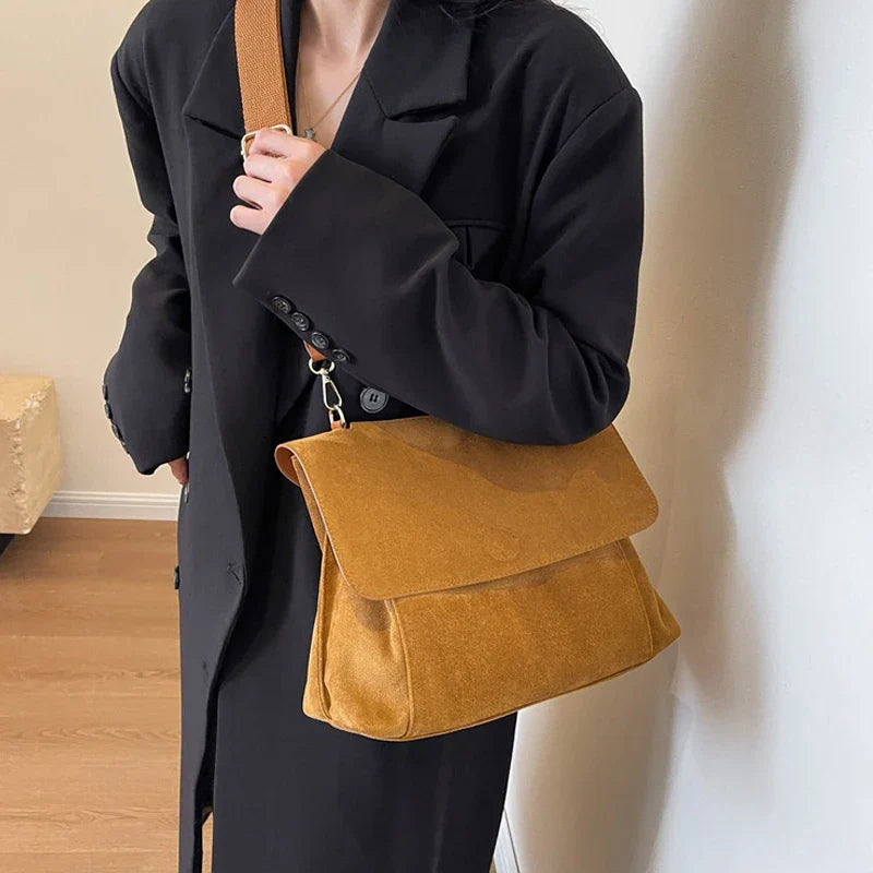 Suede bag with retro design