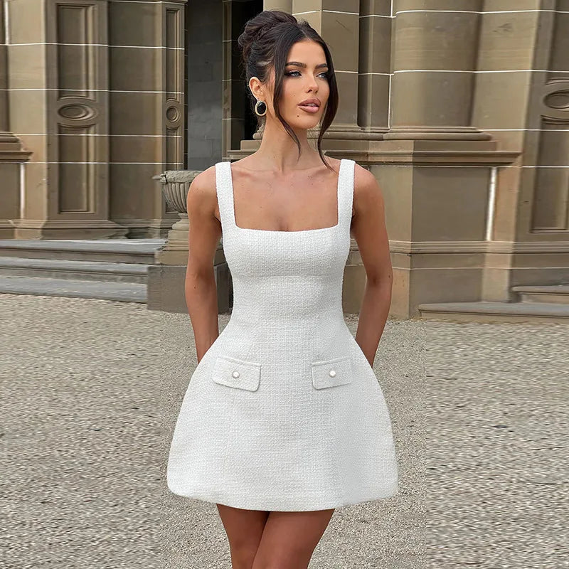 שמלת מיני בד ארוג בגזרת A בעיטור כיסים - מילי