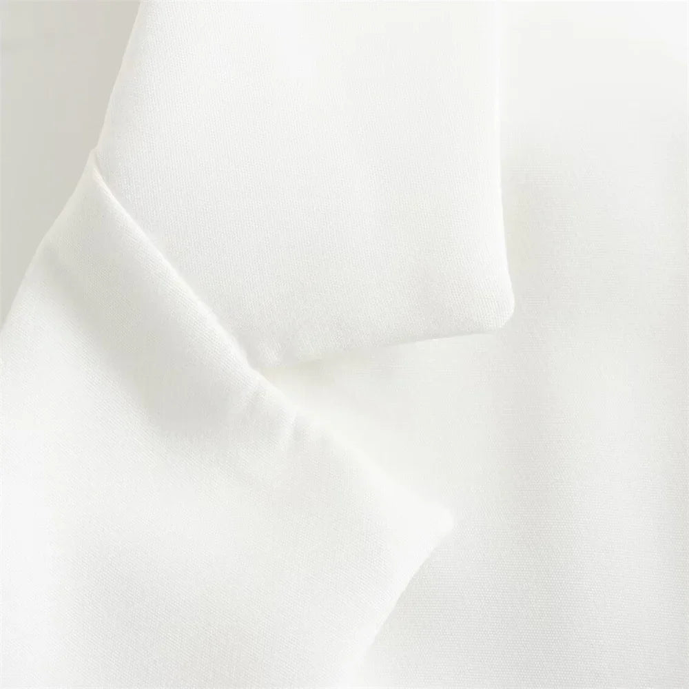 שמלת מיני מחויטת בעיצוב פתחים וחגורה בגב - דבי