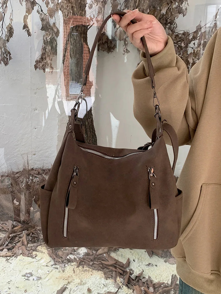 Bag with retro-style faux leather design