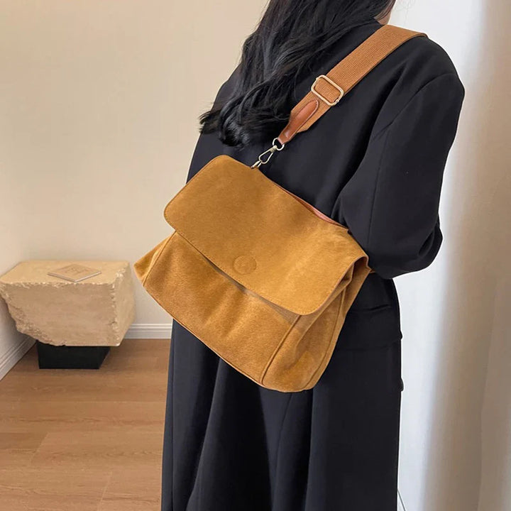 Suede bag with retro design