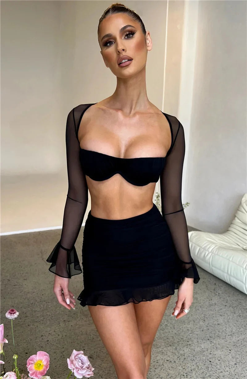 סט (חלק/נצנצים) שני חלקים חצאית מיני כיווצים בעיטור מלמלה וטופ שרוולי רשת - MICHEL