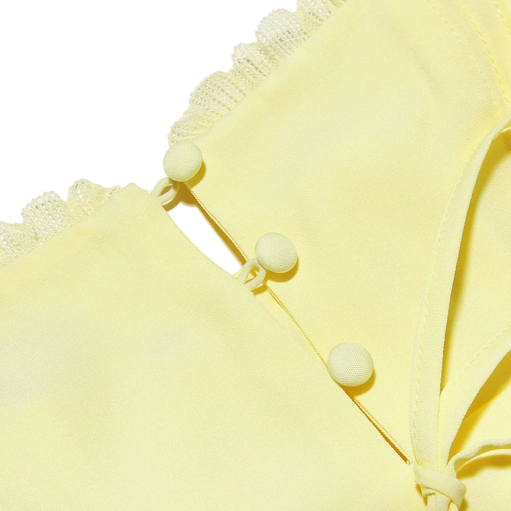 שמלת מיני בגזרת A בעיטור כפתורים וקשירה בחזה - מרום