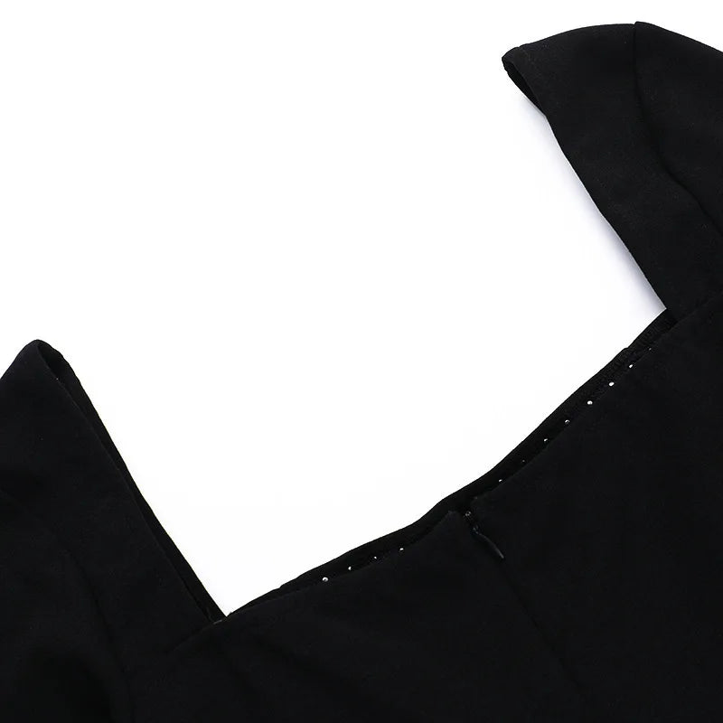 שמלת מיני בגזרת A בעיטור פנינים - קורי