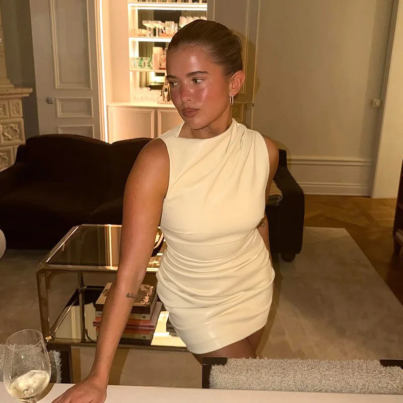 Faux leather mini dress with pleats - SIERA