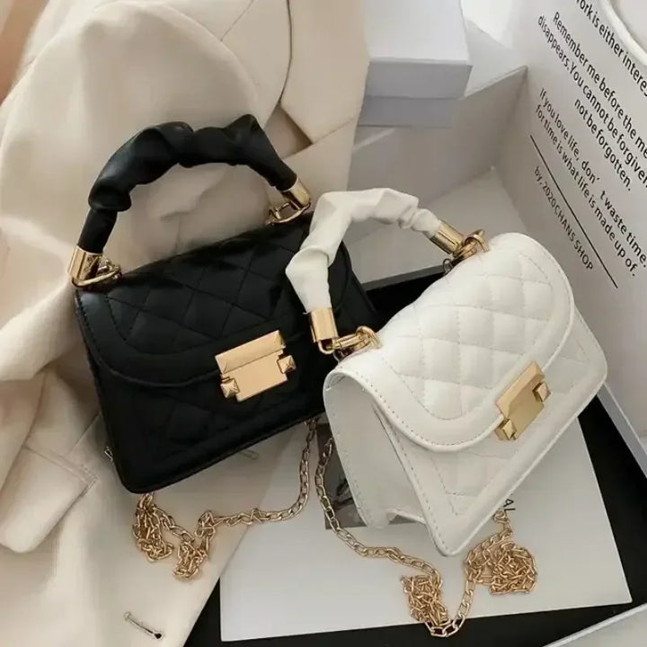Faux leather handbag combined with chain strap